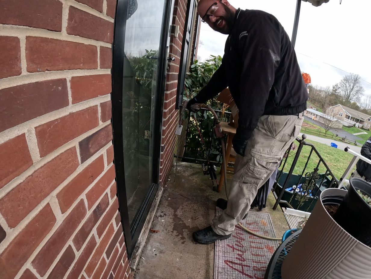 ATC Pest Control certified technician at work
